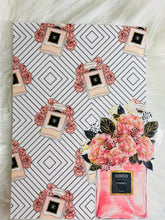 Load image into Gallery viewer, Flowered perfume bottle. 

